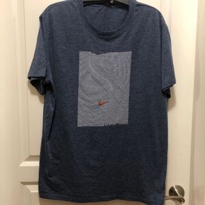 Graphic short sleeve tee blue with tiny skier size XL unisex Like new